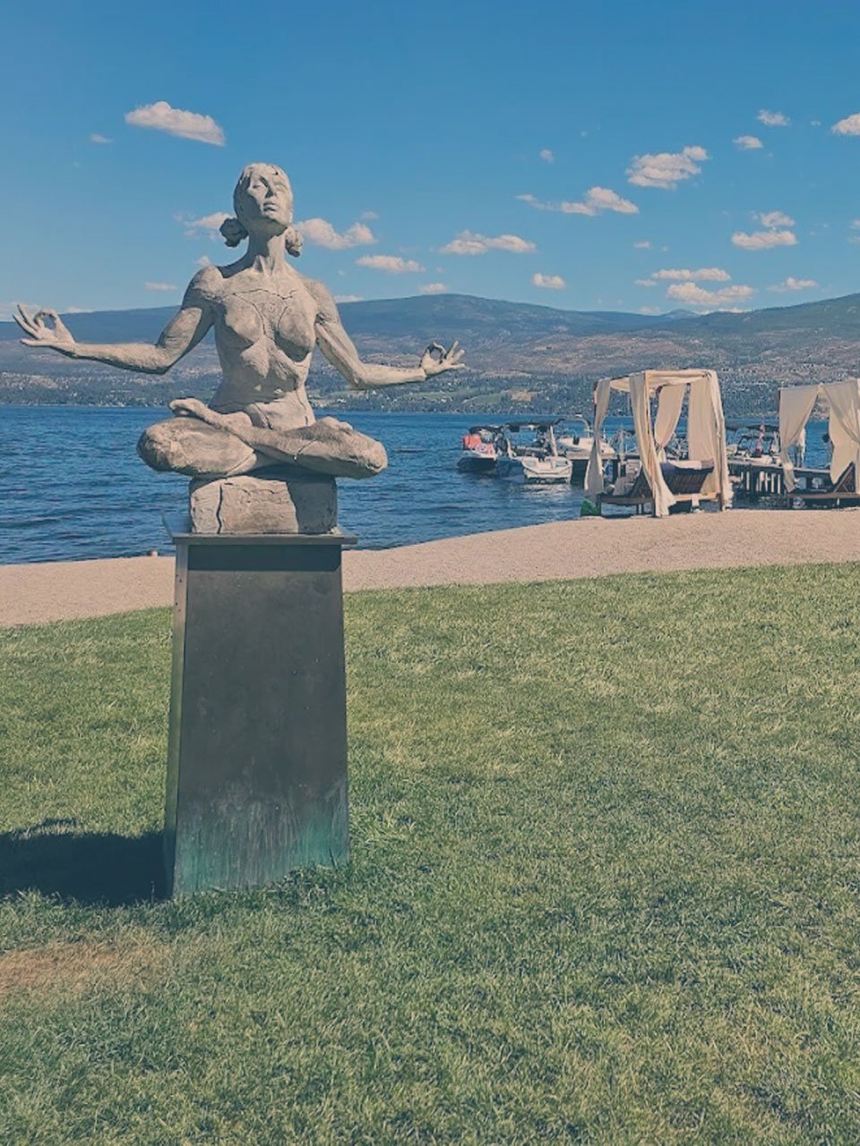 WEST_KELOWNA - okanara.com Sculpture of a meditating woman at the beach at Frind Wine Estates. okanagan mountain park